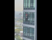Red hat window washer guy high rise 
