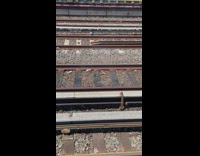 Small fire on the train tracks wood