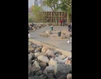 Man shirtless beach rocks pictorial tourist sunset