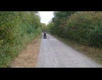Guy makes car out of green crate