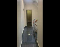 Heavy rain causes apartment hallway to flood 