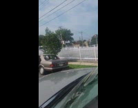 Collab winy - Man drives car no doors in street