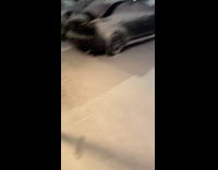 Man sees 2 huskies waiting inside car 