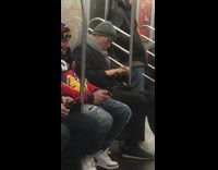 Man clips fingernails on subway train