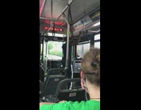 Black shirt guy stretches pull ups bus 