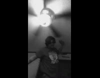 Guy stands up and purposefully hits his head on ceiling fan