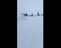 Man falls from ski slow motion video