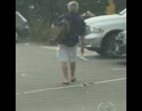 Drunk guy loses his balance and falls 