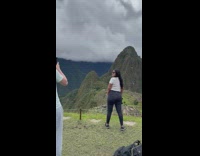 Group of people takes picture at the mountains