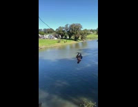 Guy flips off from rope swing 