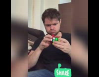 Guy does Rubiks cube magic trick and presses reset button to reset colors