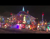 House with christmas lights and inflatable decorations 