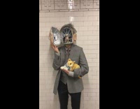 Person dressed as alien old man from Men in Black