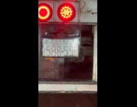 Guy shows truck with handwritten license plate