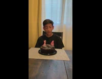 Boy blows candle on 14th birthday, brother slams head into table and misses cake