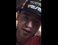 Guy gets bit in the face by a white poodle