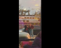 Couple takes pictures in the middle of the road 