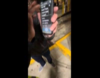 Man helping foreigner park his car 