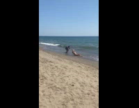 Woman white bikini video at beach shore