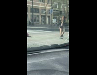 Woman black underwear straps dance on street