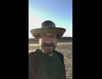 Man leather hat amused with huge beach