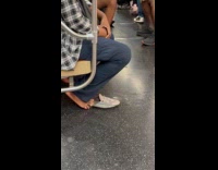 Man get off train control small blue truck