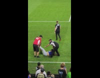 Woman Carried and Dragged Away by Men