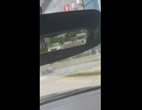 Driver sees Chucky dolls sticking out car behind them 