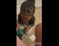 Kid tastes cranberry juice for the first time 