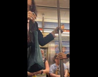 Collab Subway Creatures - Person wearing pink thongs over pants dance inside the subway