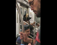 women tells little boy in green pants to stop spitting