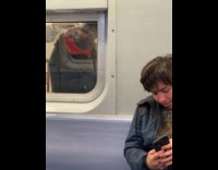 Collab WINY - Man licks glass of subway train window