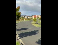 Guy skids butt on pavement after losing balance on skateboard