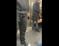 Subway lights turn off and a kid talk on the intercom 