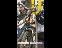 Bike locked onto pole on subway train