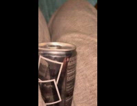 Soda can pierced and air exits hole