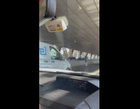 Guy is on electric scooter on bridge freeway