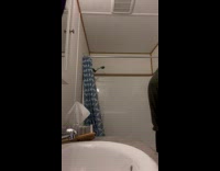 Lady Fails to Catch Moth in Bathroom