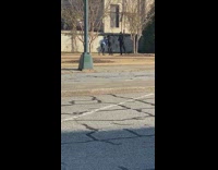 Guy over the shoulder throw girl street