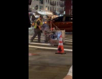 Submitter films road workers painting crosswalk lines