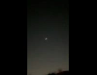 Strange light float on the night sky