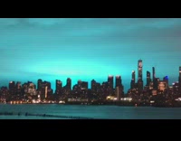 nyc skyline blue flashing lights night sky