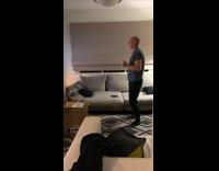 Dad in living room dancing to doja cat music video 