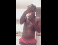 shirtless man dances with hot sauce