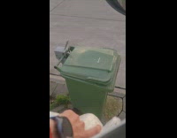 Wind help lift cover of trash bin