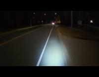 Filmer rides bike and crosses the railroad