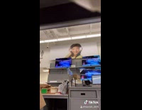 Girl pushes coworker cheetah print mask