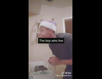 Guy in bathroom green alien filter shower 