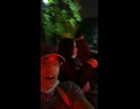 Woman and friends outside mcdonalds with firefighter response