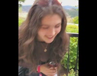 Two woman stripe pants photo shoot party